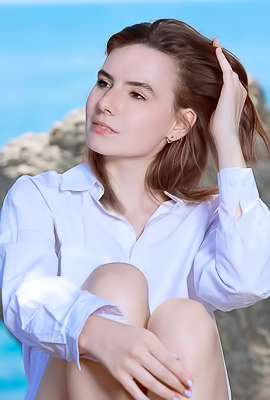 Nika Smiling With Pleasure As The Stimulating Ocean Breeze Caresses Her Sexy Body