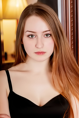 Evelin Her Soft Breasts Bare And Her Mesmerizing Blue Eyes Shining Seductively