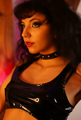 Mitzi X Explores Her Kinky Side In A Dungeon With Masturbation And Dominant Poses